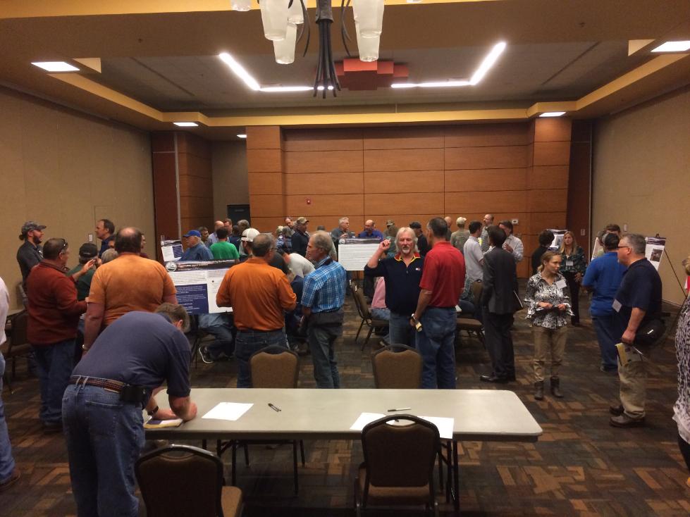a group of people in a conference room