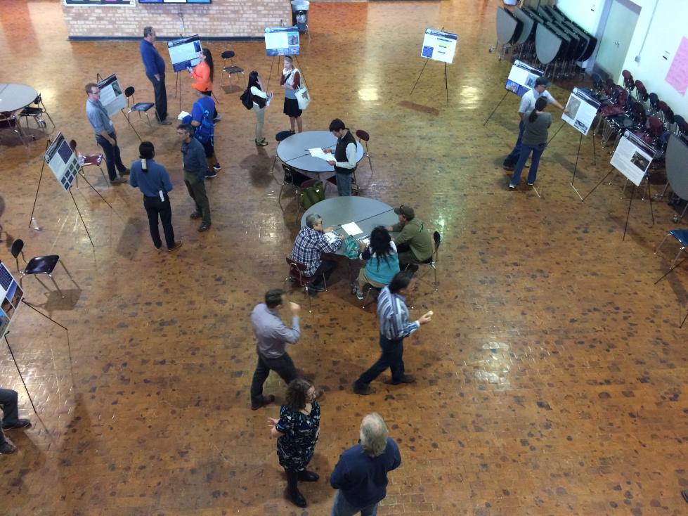 people scattered around a conference room