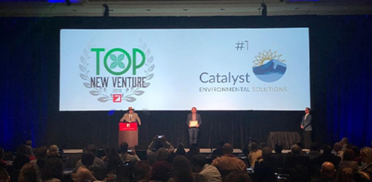 Catalyst employee receving the Top Venture of 2019 Zweig award