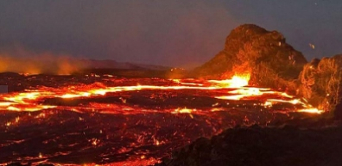 lava flowing lava into a volcano