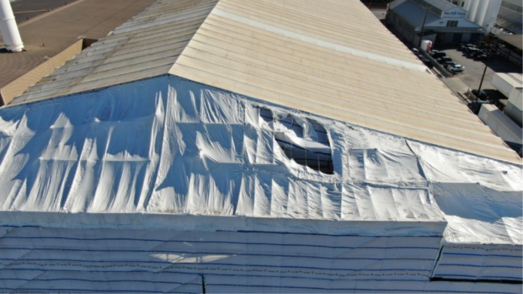 a roof covered in plastic